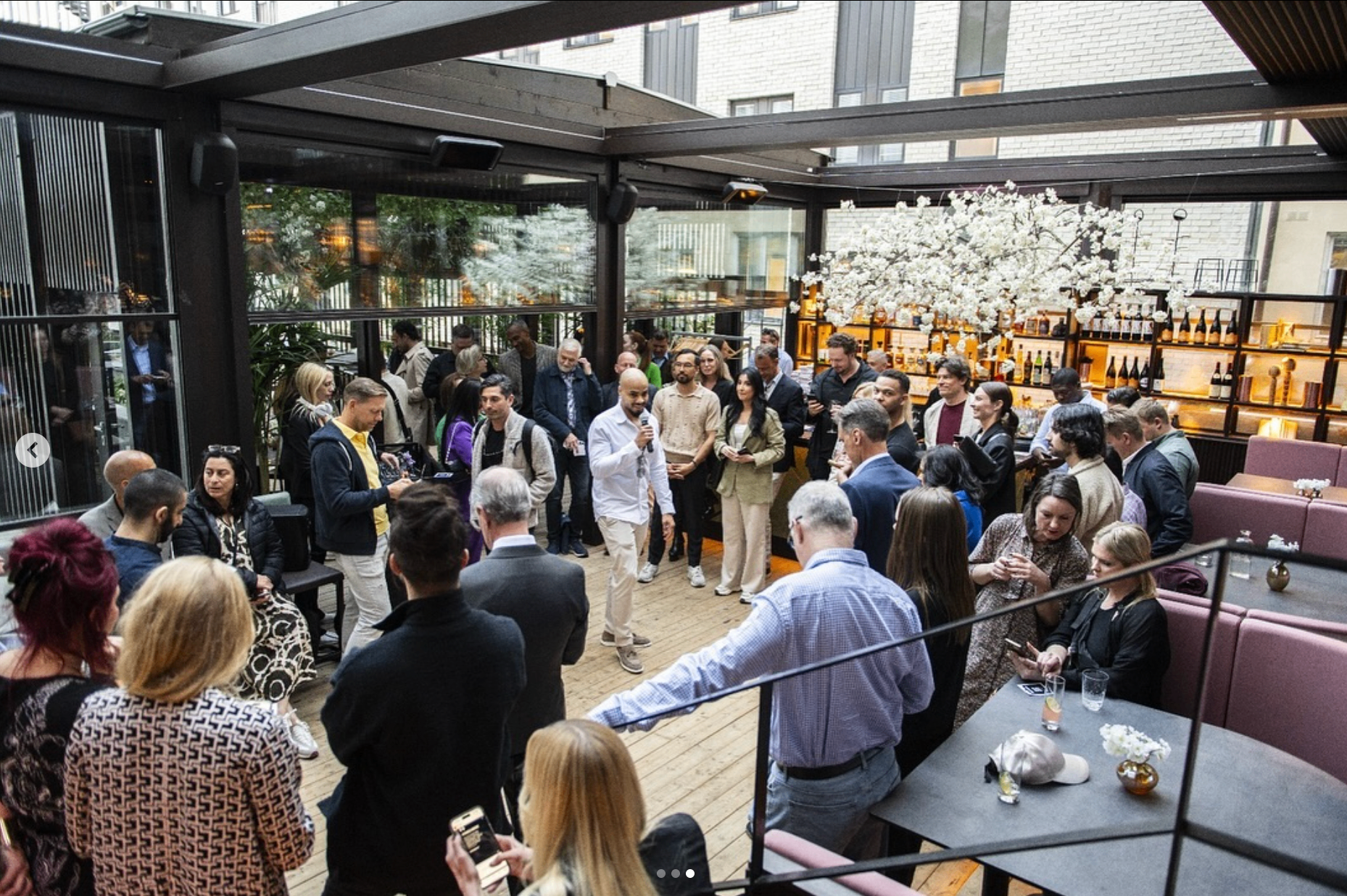 Kai Beard in conversation at a premium networking event